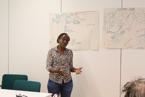 Hub leader Cecilia Onyango presents the hub at meeting in Sweden.