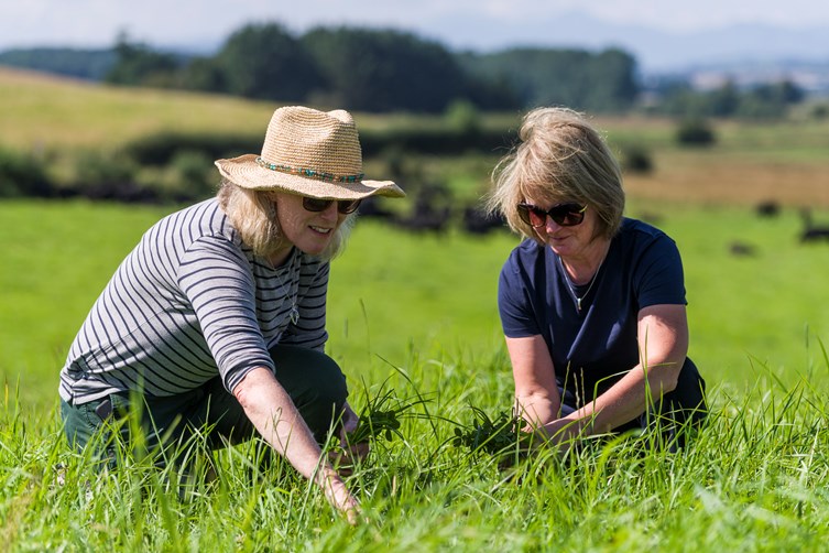 Two women in a field.