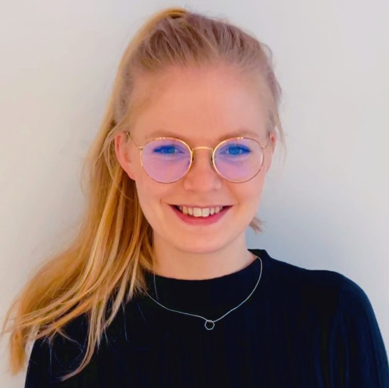 Head shot of a young woman. Photo.