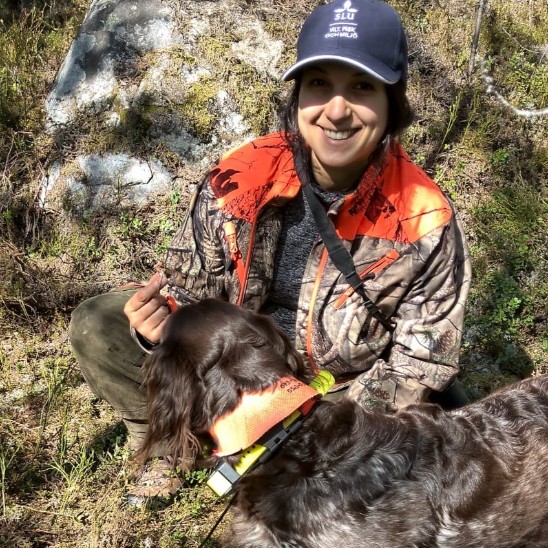 Desirée and her dog. Photo. 